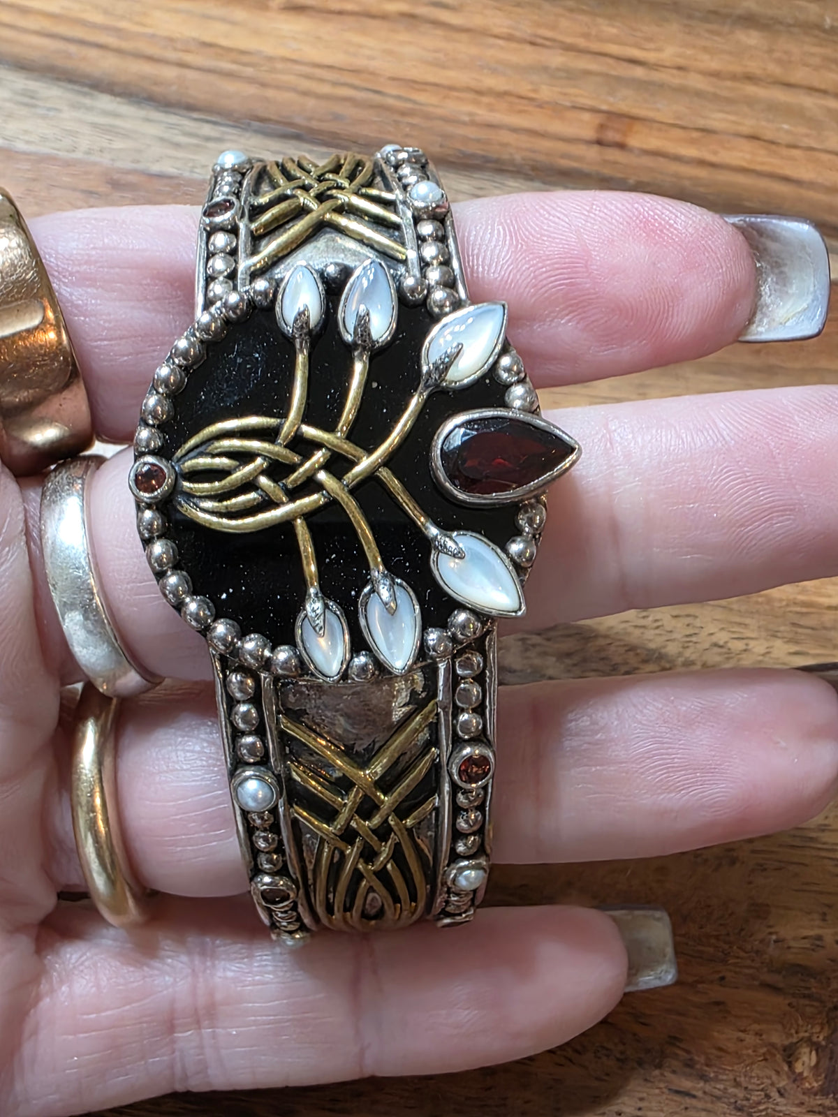 Echo of the Dreamer Sterling Silver Bronze Onyx Garnet Lily Cuff Bracelet