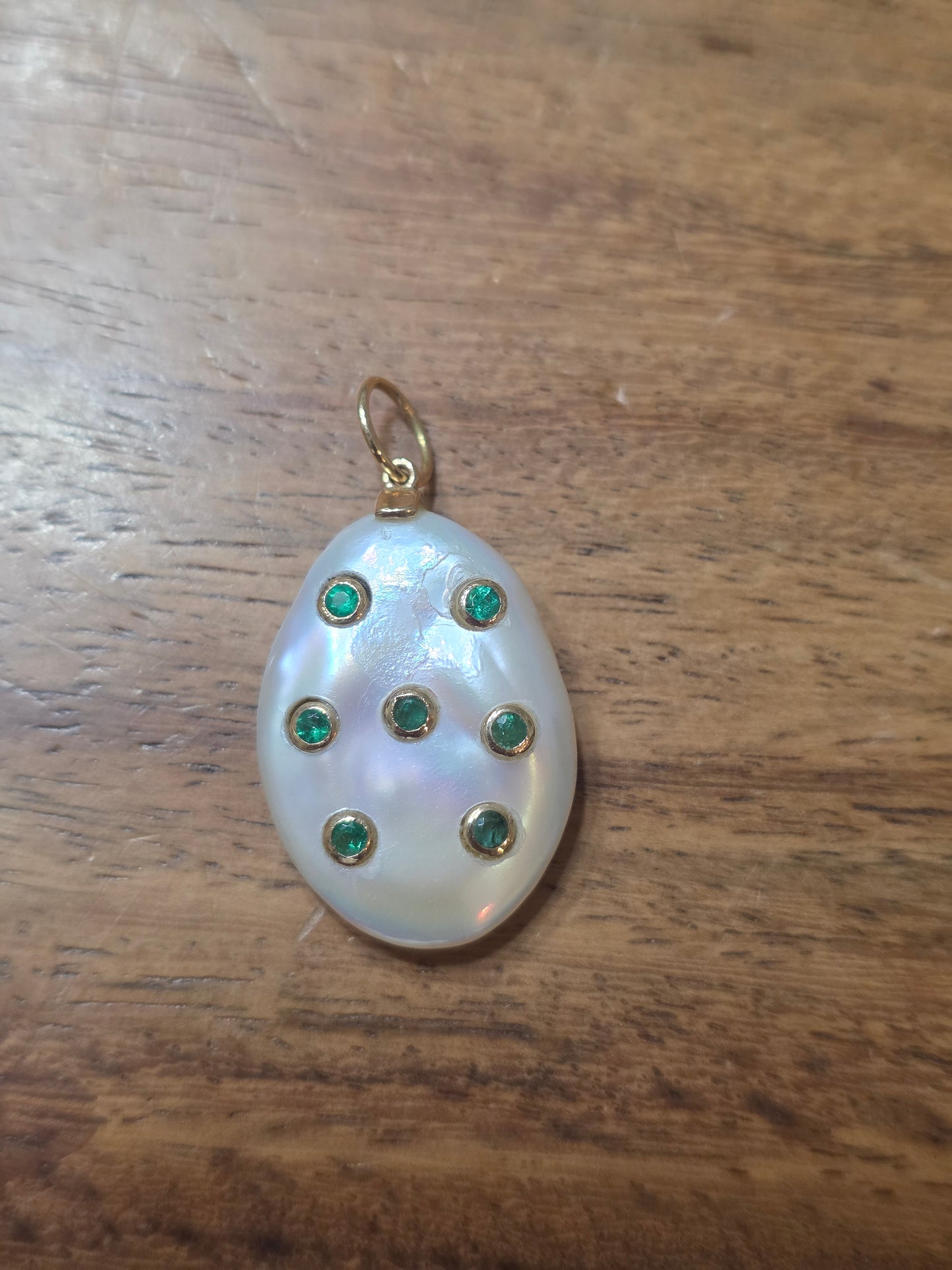 Bezel Set Emeralds on a Coin Pearl
